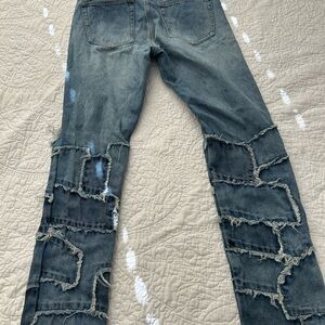 Distressed patchwork slim jeans size 30